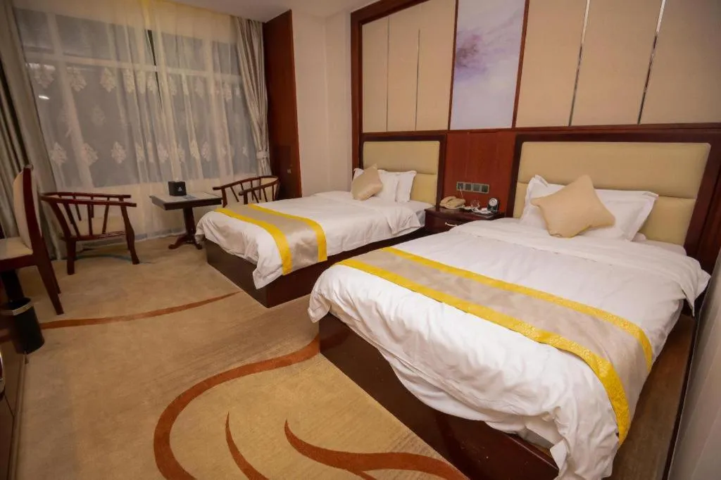 Bed in Grand Szechuan Hotel Vientiane