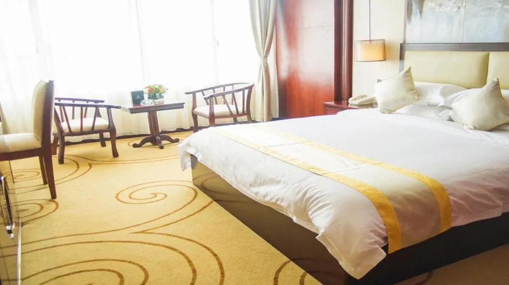 Bed in Grand Szechuan Hotel Vientiane