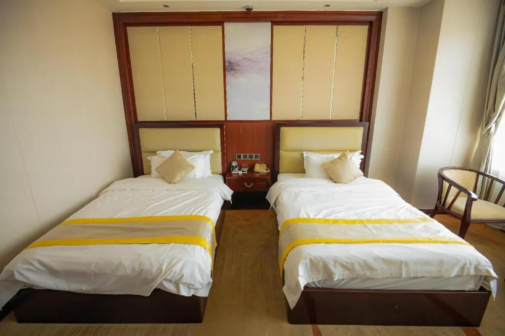 Bed in Grand Szechuan Hotel Vientiane