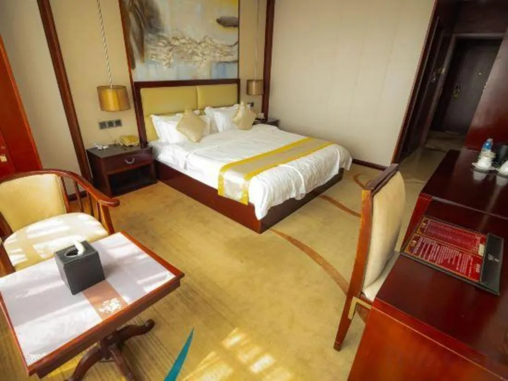 Bed in Grand Szechuan Hotel Vientiane