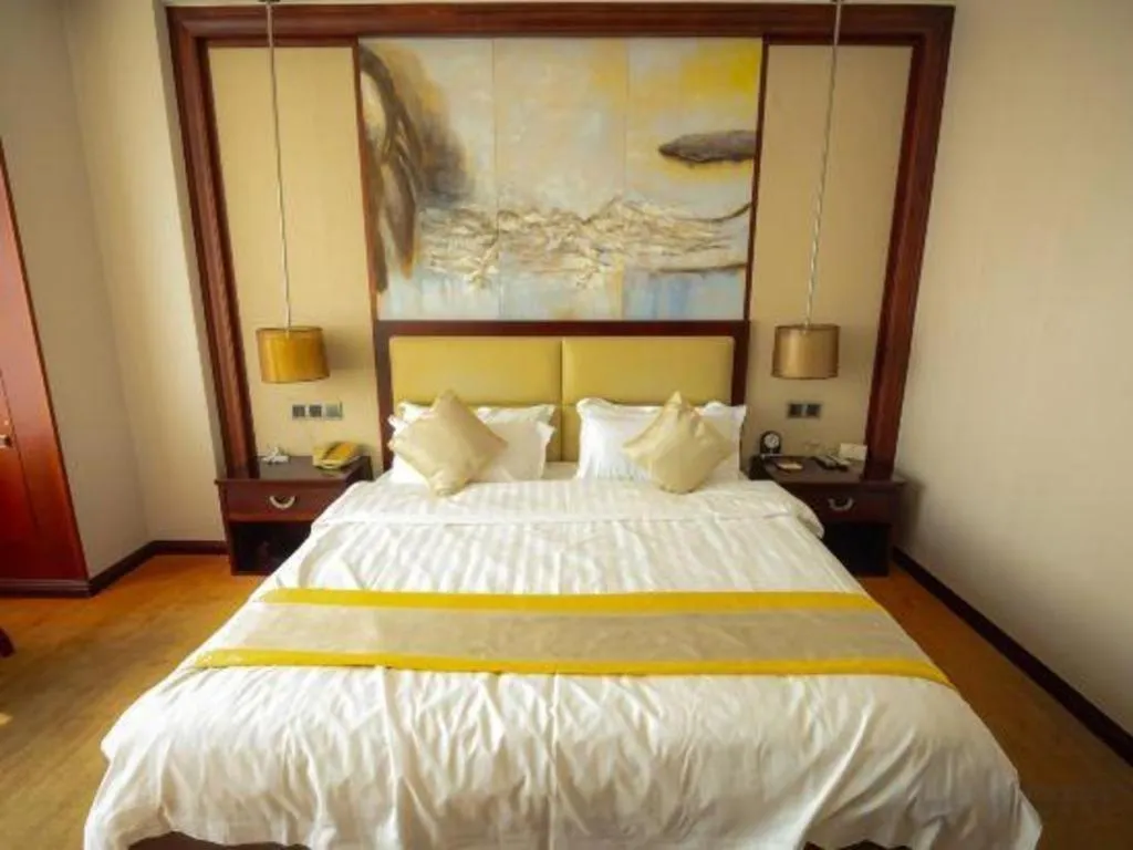 Bed in Grand Szechuan Hotel Vientiane