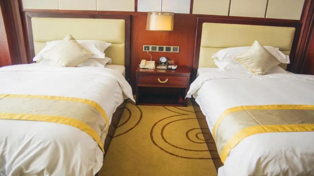 Bed in Grand Szechuan Hotel Vientiane