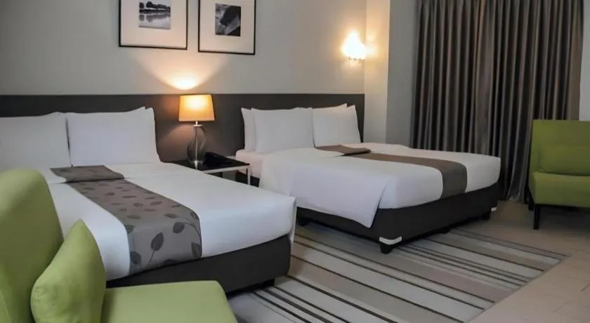 Bed in Sequoia Hotel Quezon City