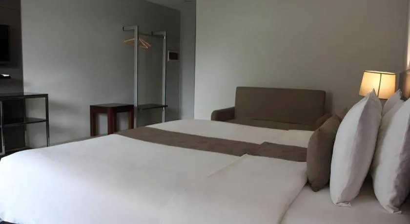 Bed in Sequoia Hotel Quezon City