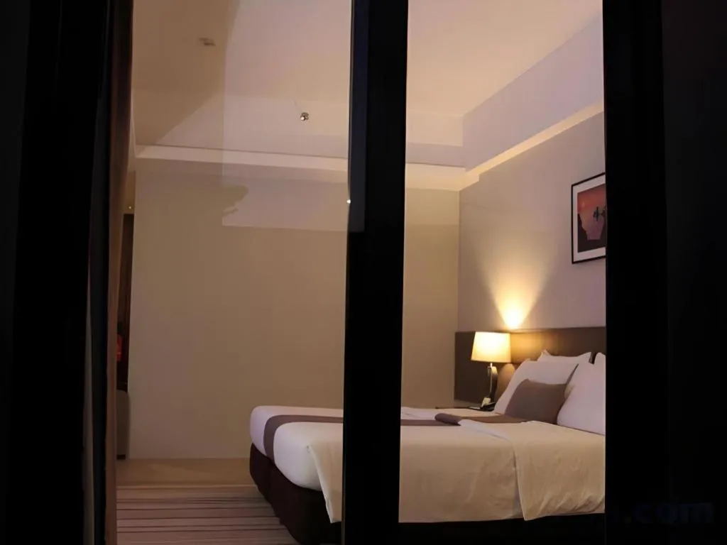 Bed in Sequoia Hotel Quezon City