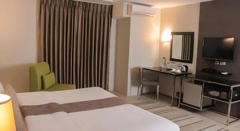 Bed in Sequoia Hotel Quezon City