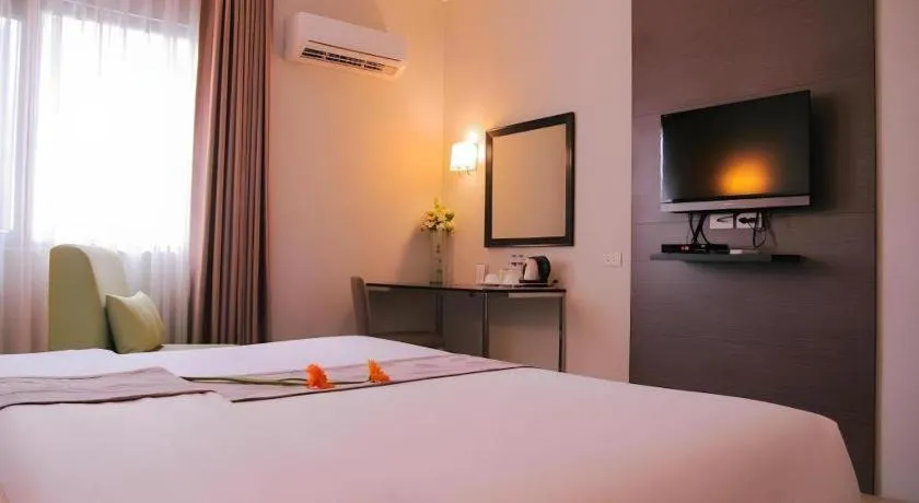 Bed in Sequoia Hotel Quezon City