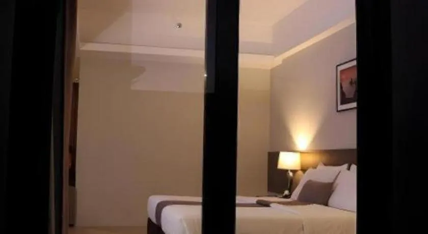 Bed in Sequoia Hotel Quezon City