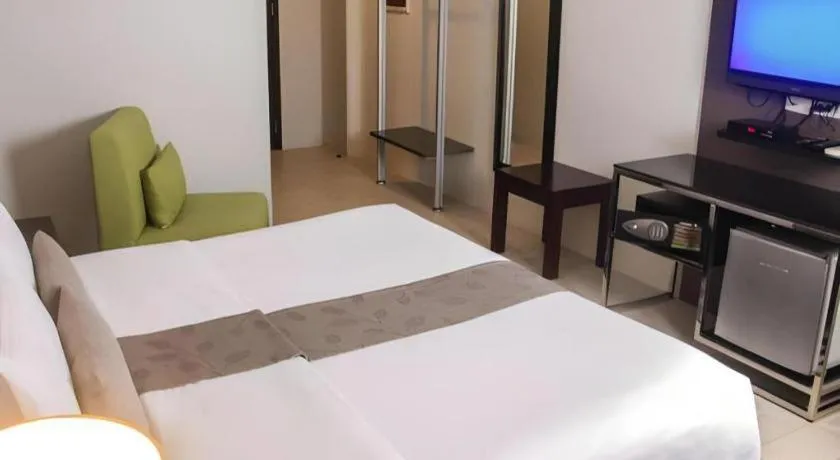 Bed in Sequoia Hotel Quezon City