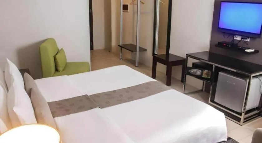 Bed in Sequoia Hotel Quezon City