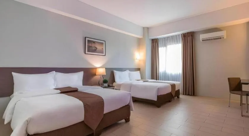 Bed in Sequoia Hotel Quezon City