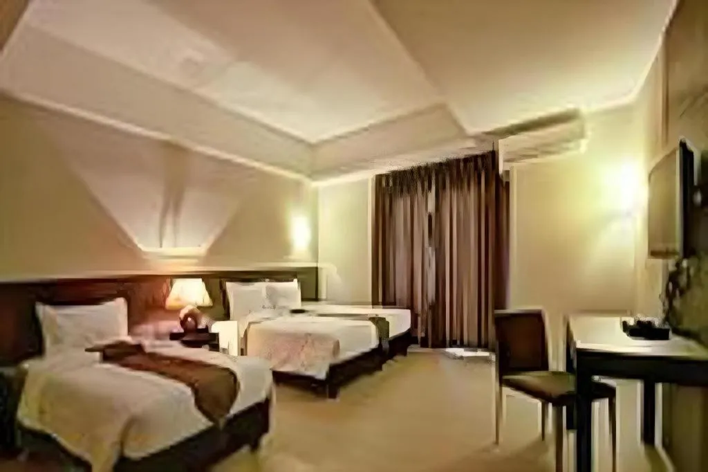 Bed in Sequoia Hotel Quezon City