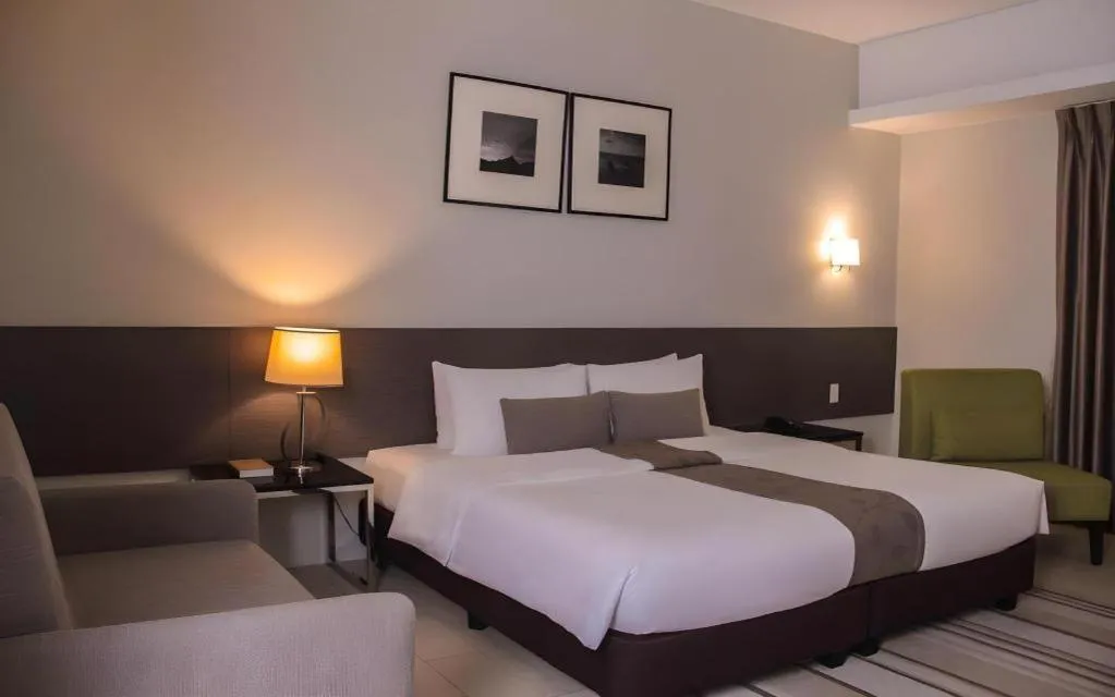 Bed in Sequoia Hotel Quezon City