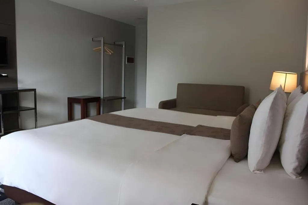 Bed in Sequoia Hotel Quezon City