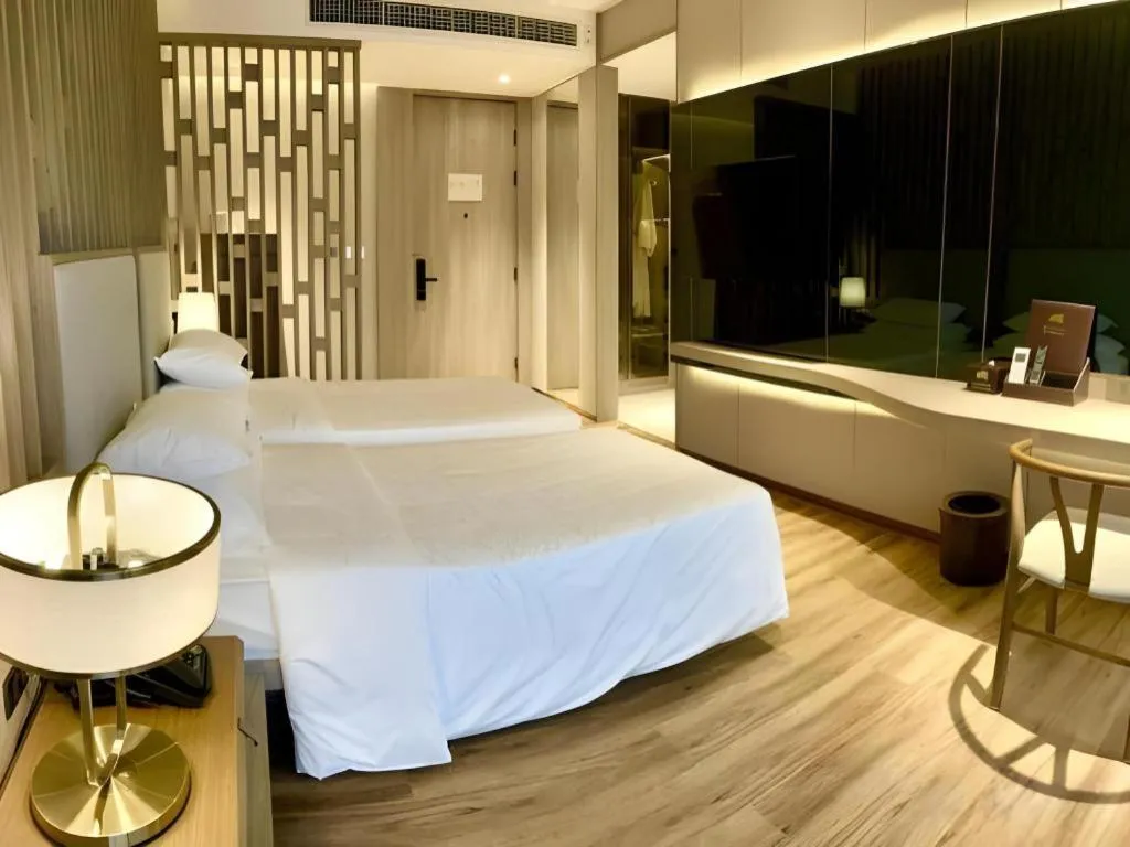 Bed in Symphony of The Sea Hotel