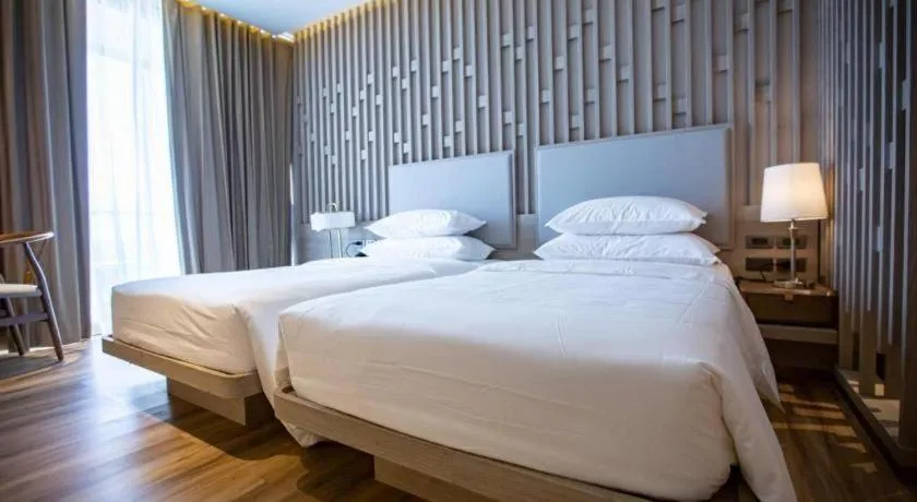 Bed in Symphony of The Sea Hotel