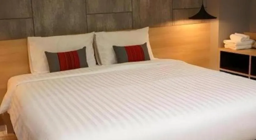 Bed in Sans Hotel