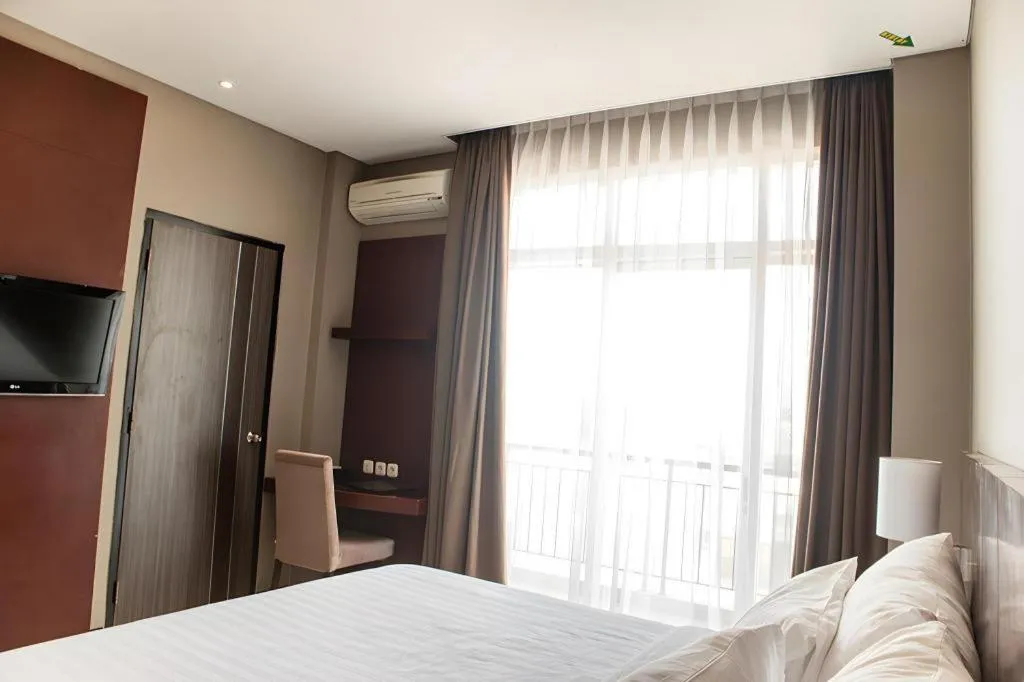 Bed in Karlita Hotel Tegal