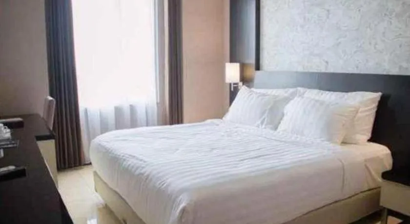 Bed in Karlita Hotel Tegal