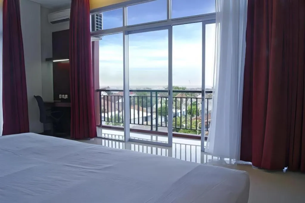 Bed in Karlita Hotel Tegal