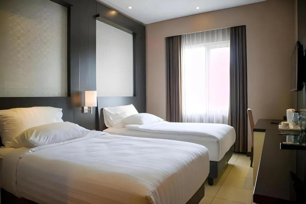 Bed in Karlita Hotel Tegal