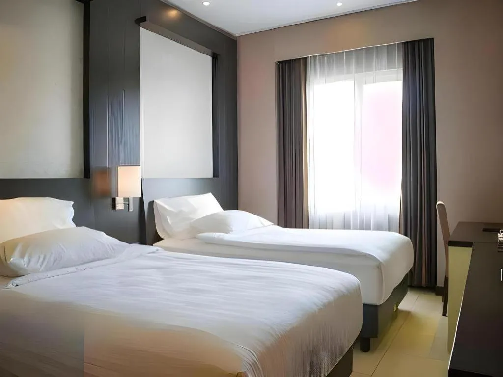 Bed in Karlita Hotel Tegal