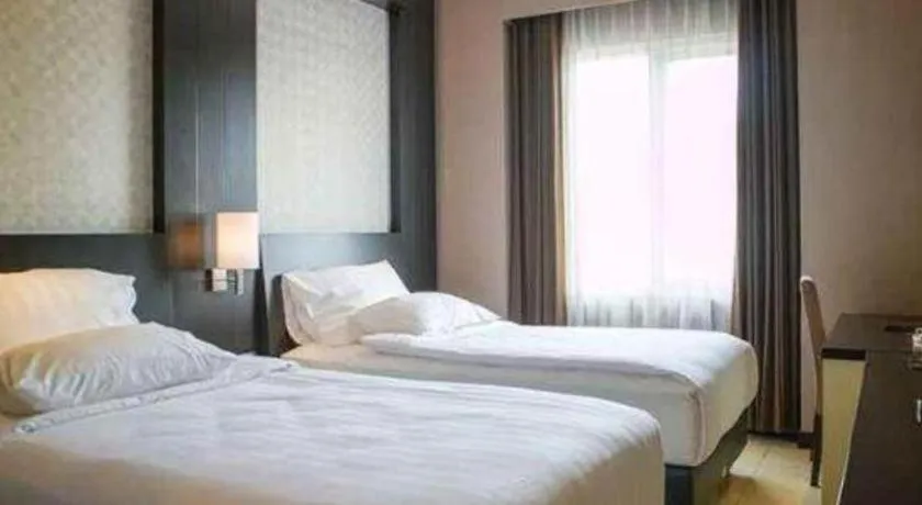 Bed in Karlita Hotel Tegal