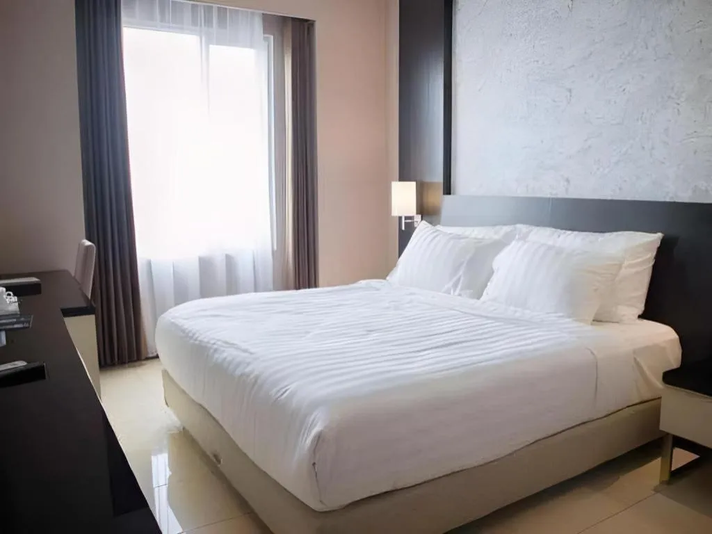 Bed in Karlita Hotel Tegal