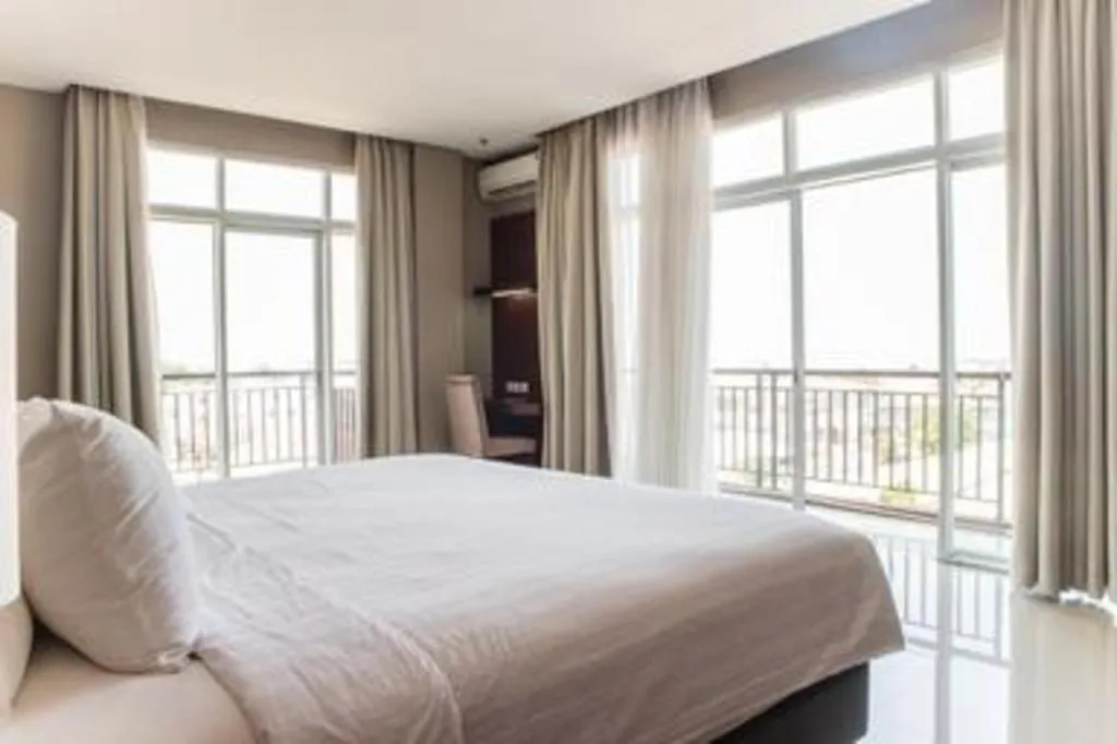 Bed in Karlita Hotel Tegal