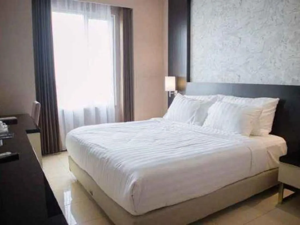 Bed in Karlita Hotel Tegal