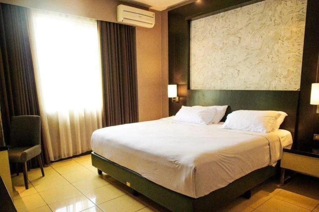 Bed in Karlita Hotel Tegal
