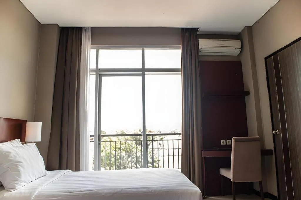 Bed in Karlita Hotel Tegal