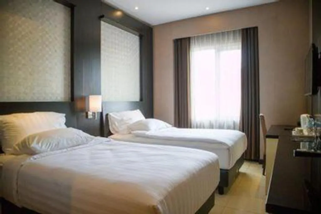 Bed in Karlita Hotel Tegal