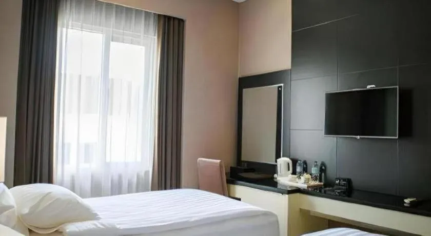 Bed in Karlita Hotel Tegal