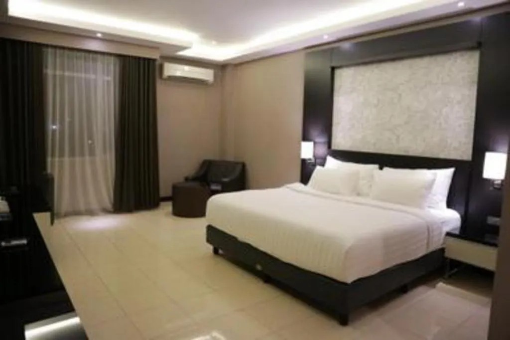 Bed in Karlita Hotel Tegal