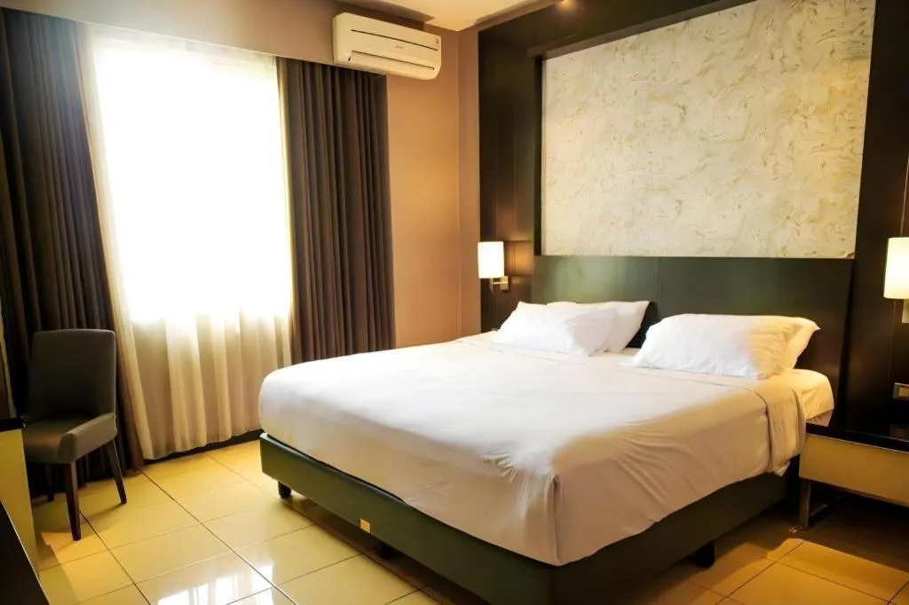 Bed in Karlita Hotel Tegal