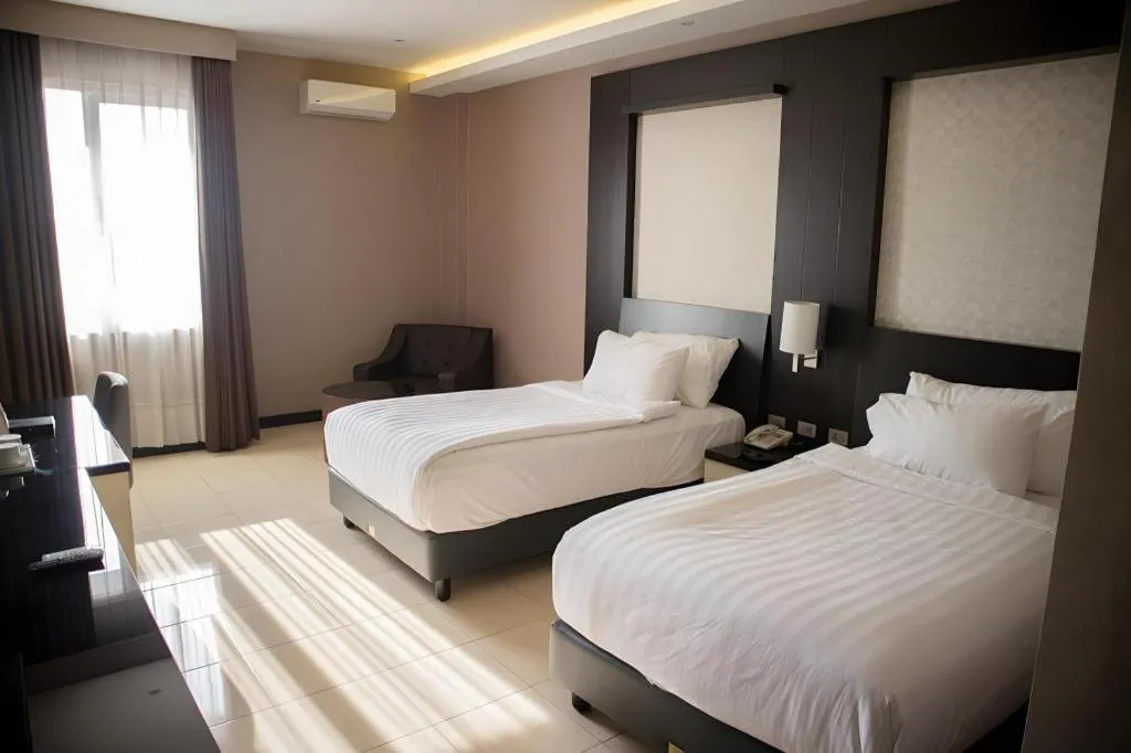 Bed in Karlita Hotel Tegal