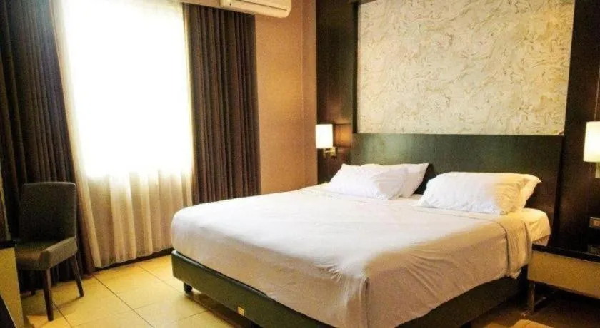 Bed in Karlita Hotel Tegal