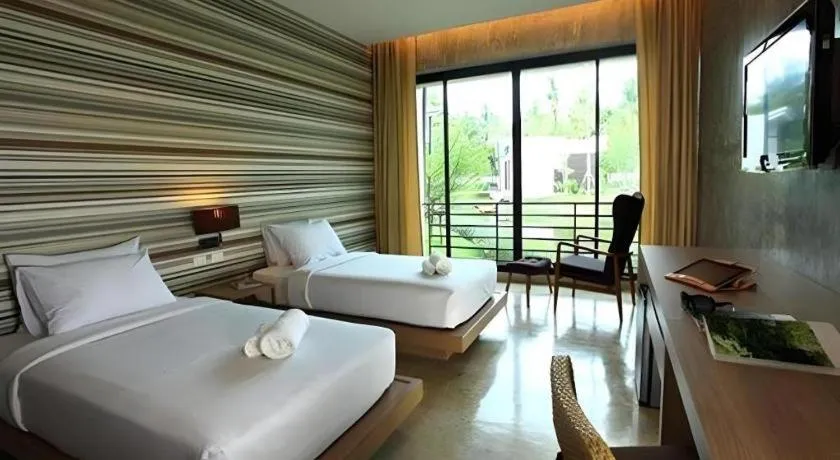 Bed in Lumphawa Amphawa Resort