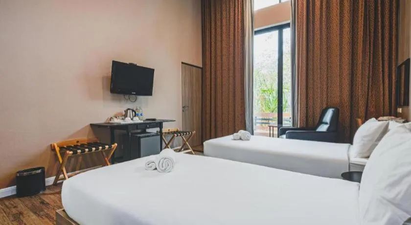 Bed in Lumphawa Amphawa Resort