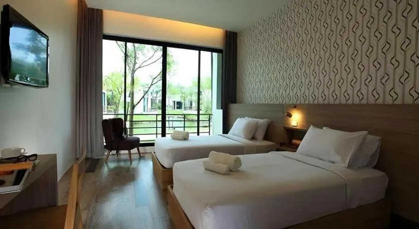 Bed in Lumphawa Amphawa Resort