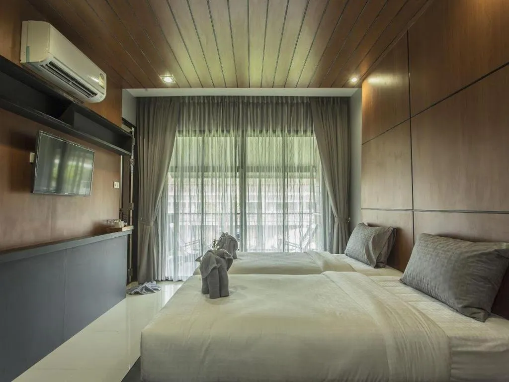 Bed in The Breeze Lipe Resort