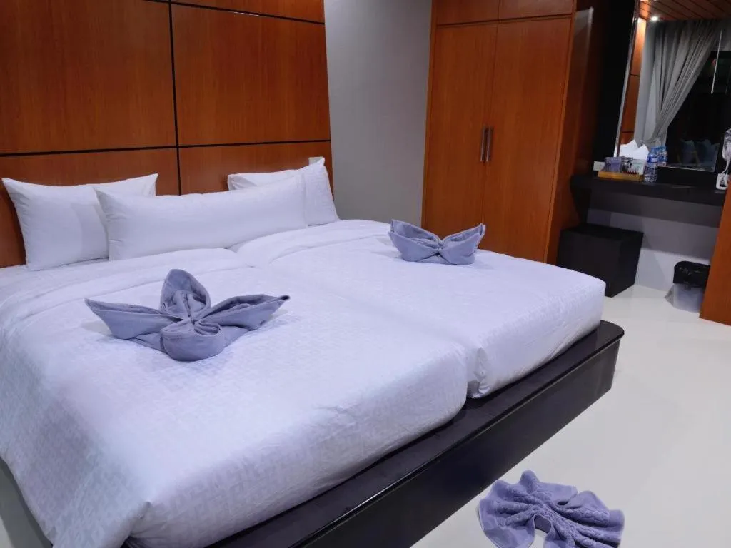 Bed in The Breeze Lipe Resort