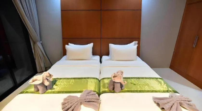 Bed in The Breeze Lipe Resort