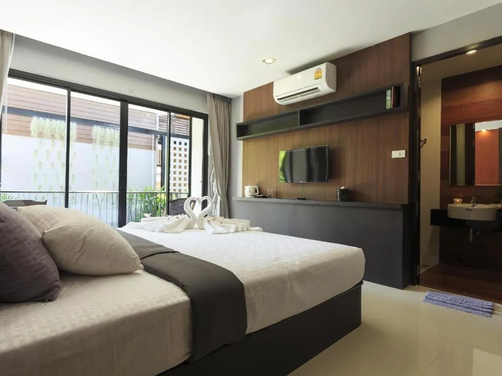 Bed in The Breeze Lipe Resort