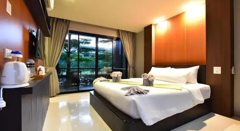 Bed in The Breeze Lipe Resort Bed in The Breeze Lipe Resort