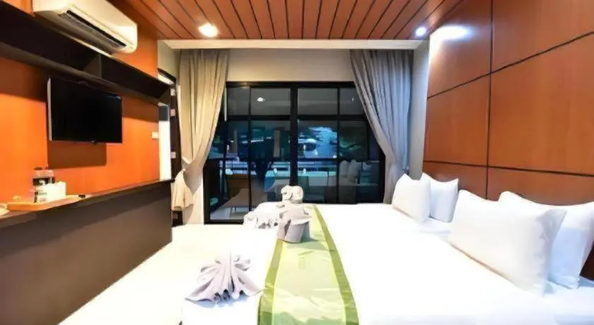 Bed in The Breeze Lipe Resort