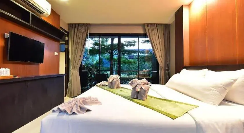 Bed in The Breeze Lipe Resort Bed in The Breeze Lipe Resort