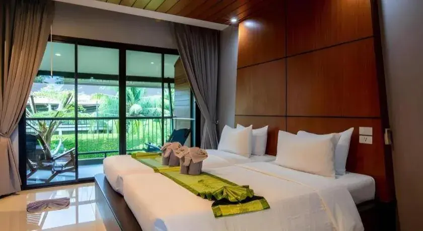 Bed in The Breeze Lipe Resort Bed in The Breeze Lipe Resort