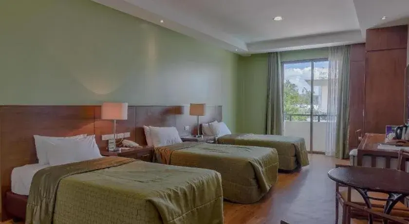 Bed in Mansion Garden Hotel Bed in Mansion Garden Hotel